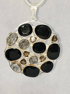 Statement Designer Pendant in Natural Ruby with Sterling Silver Base.