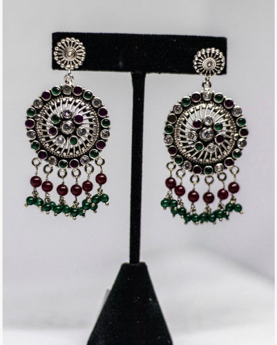 Traditional Indian handcrafted earrings made in 925 Silver and Majanta Pink and Green